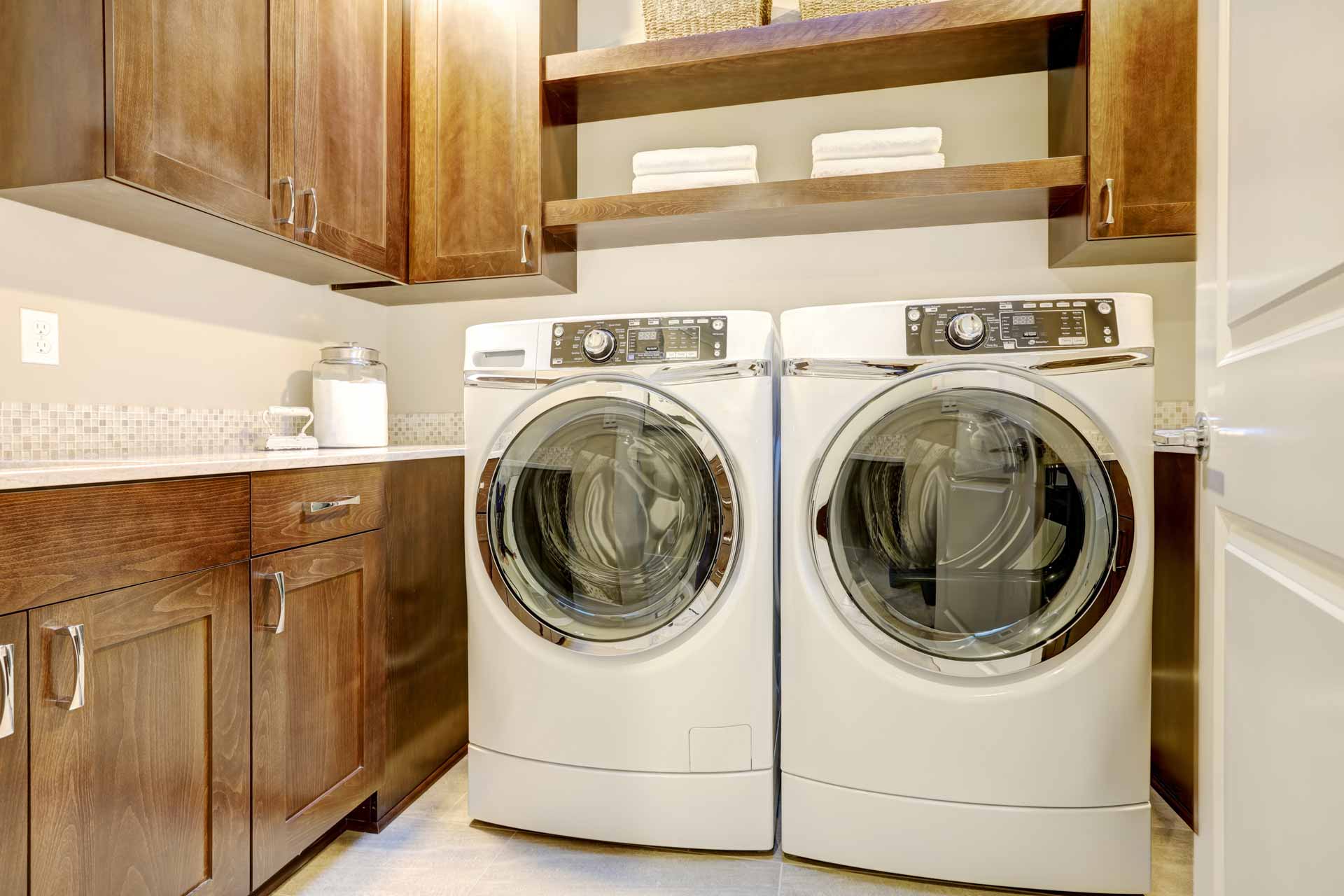 Side-by-side washer and dryer units